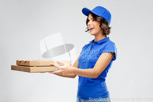 Image of delivery woman with takeaway pizza boxes