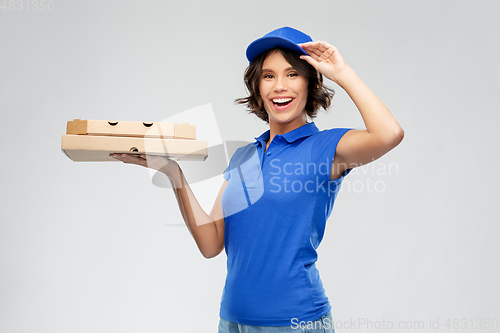 Image of delivery woman with takeaway pizza boxes