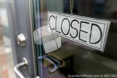 Image of glass door of closed shop or office
