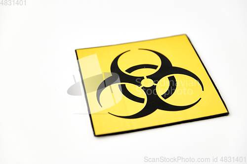 Image of biohazard caution sign on white background