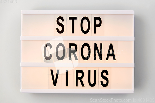 Image of lightbox with stop coronavirus caution words