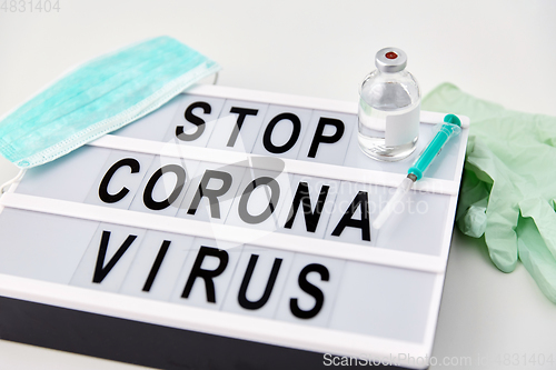 Image of lightbox with stop coronavirus caution words