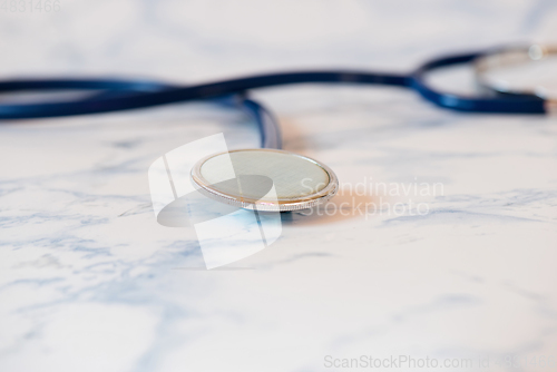 Image of Medical stethoscope or phonendoscope over light blue background