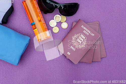 Image of Top view of some summer travel accessories