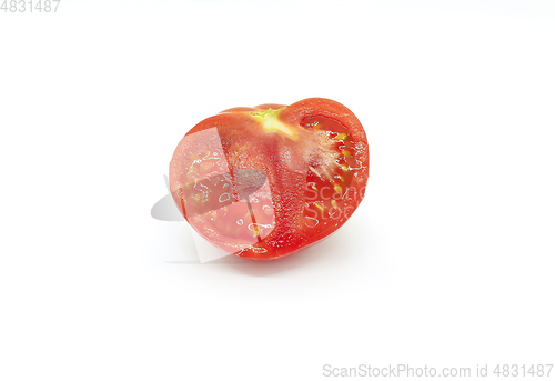 Image of Cut red tomatoe on a white background