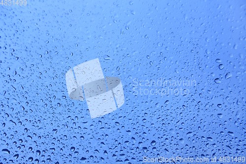 Image of Water drops on glass, natural blue texture