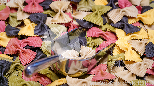 Image of Colored Farfalle Pasta bow tie pasta background.