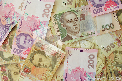 Image of different Ukrainian money in cash