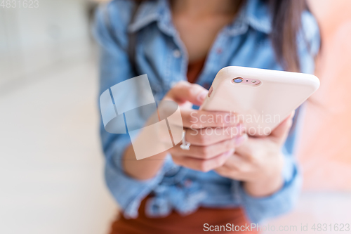 Image of Woman use of cellphone