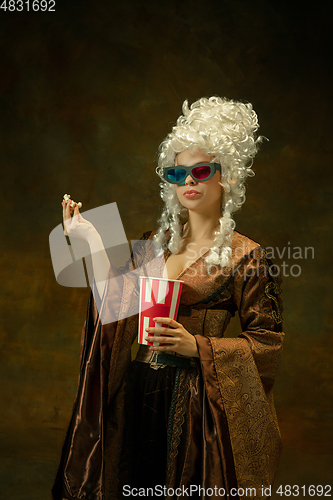 Image of Medieval young woman in old-fashioned costume