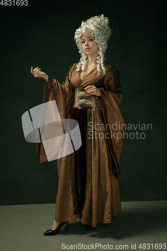 Image of Medieval young woman in old-fashioned costume