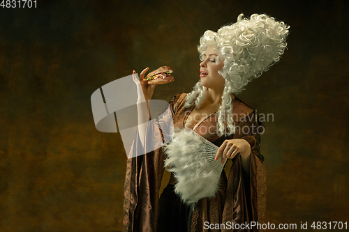 Image of Medieval young woman in old-fashioned costume