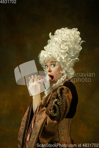 Image of Medieval young woman in old-fashioned costume