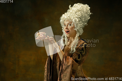 Image of Medieval young woman in old-fashioned costume