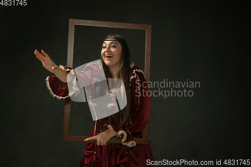 Image of Medieval young woman in old-fashioned costume