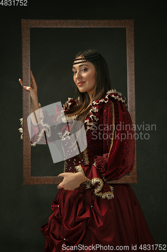 Image of Medieval young woman in old-fashioned costume