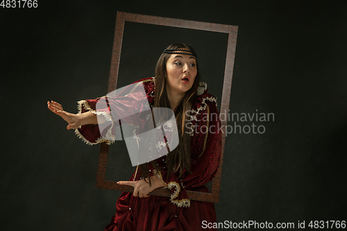 Image of Medieval young woman in old-fashioned costume