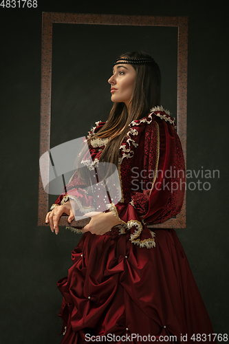 Image of Medieval young woman in old-fashioned costume