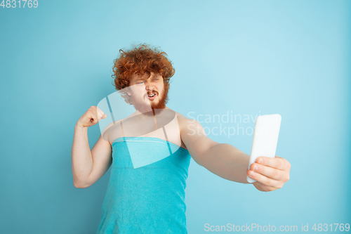 Image of Portrait of young caucasian man in his beauty day and skin care routine