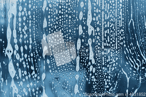 Image of Natural texture with soap foam pattern on glass
