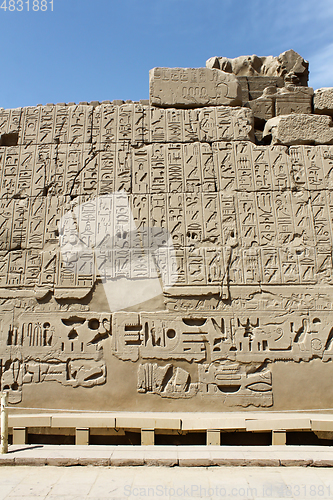 Image of Ancient stone wall with egyptian hieroglyphs