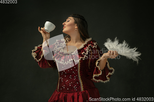 Image of Medieval young woman in old-fashioned costume