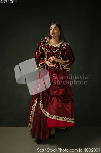 Image of Medieval young woman in old-fashioned costume