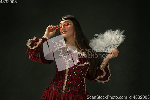 Image of Medieval young woman in old-fashioned costume