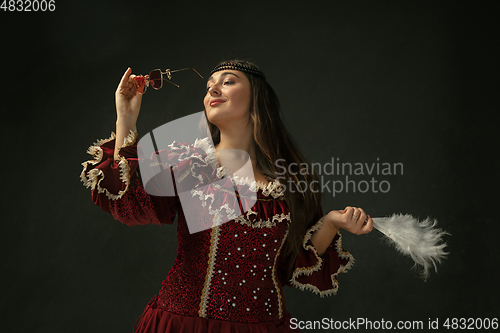 Image of Medieval young woman in old-fashioned costume