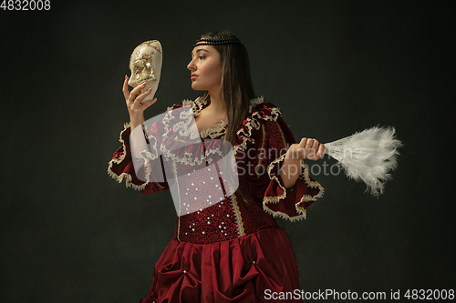 Image of Medieval young woman in old-fashioned costume