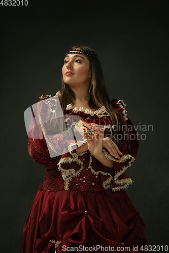 Image of Medieval young woman in old-fashioned costume