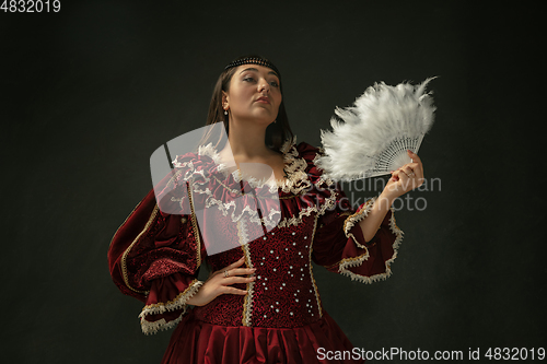 Image of Medieval young woman in old-fashioned costume