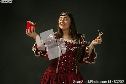 Image of Medieval young woman in old-fashioned costume