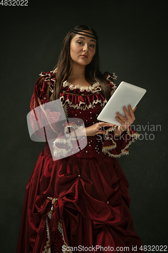 Image of Medieval young woman in old-fashioned costume