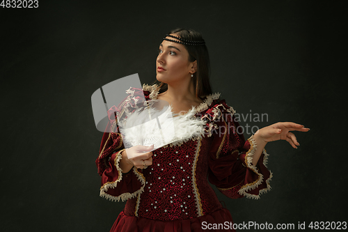 Image of Medieval young woman in old-fashioned costume