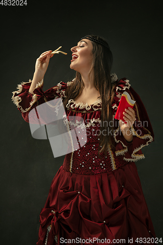 Image of Medieval young woman in old-fashioned costume