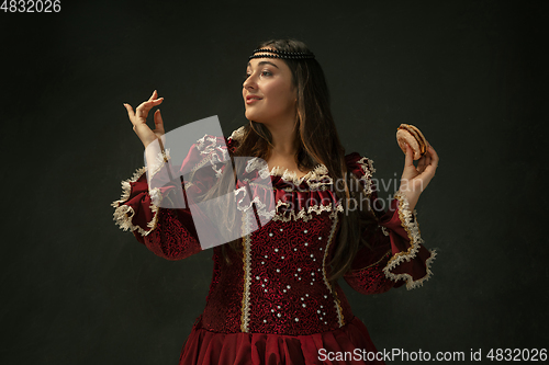 Image of Medieval young woman in old-fashioned costume