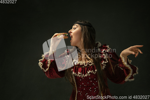 Image of Medieval young woman in old-fashioned costume