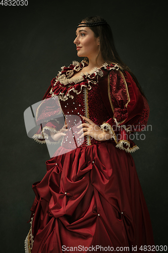 Image of Medieval young woman in old-fashioned costume