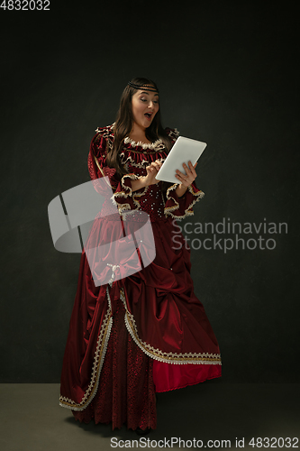 Image of Medieval young woman in old-fashioned costume