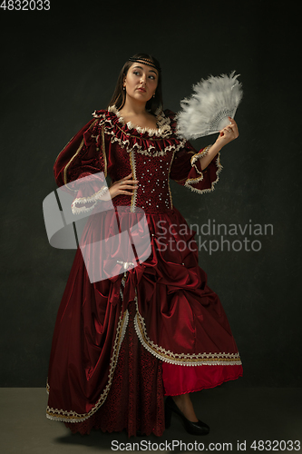 Image of Medieval young woman in old-fashioned costume