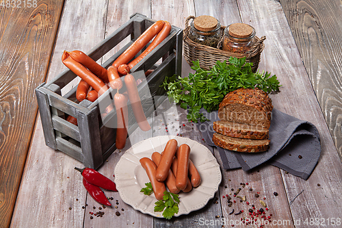 Image of Sausages And The Bread