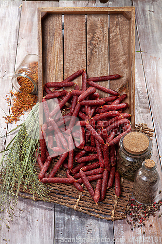 Image of Sausages On A Wooden Table