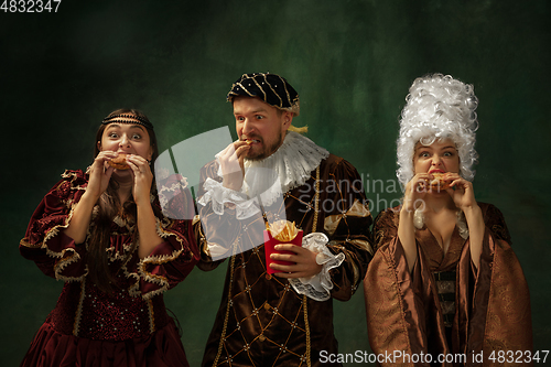 Image of Medieval young man and women in old-fashioned costume