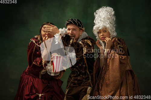 Image of Medieval young man and women in old-fashioned costume