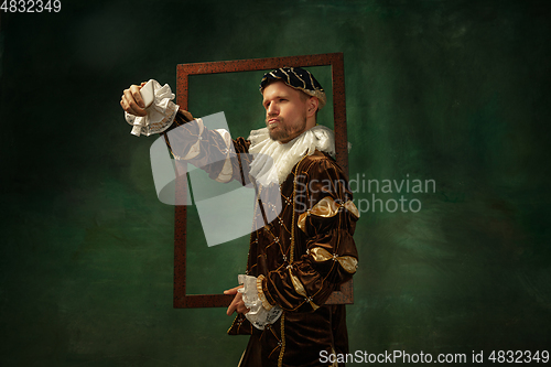 Image of Medieval young man in old-fashioned costume