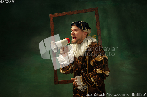 Image of Medieval young man in old-fashioned costume