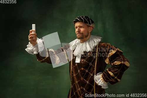 Image of Medieval young man in old-fashioned costume