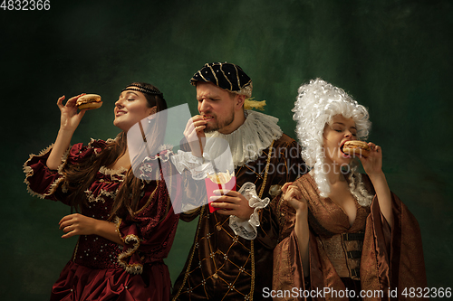 Image of Medieval young man and women in old-fashioned costume