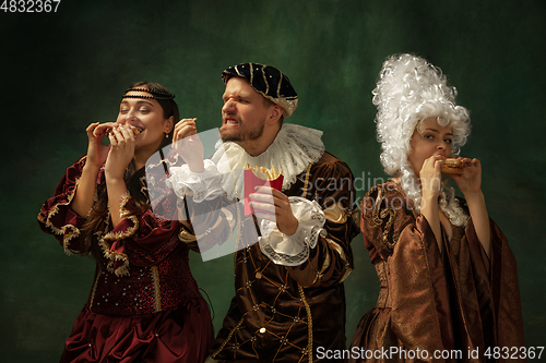 Image of Medieval young man and women in old-fashioned costume